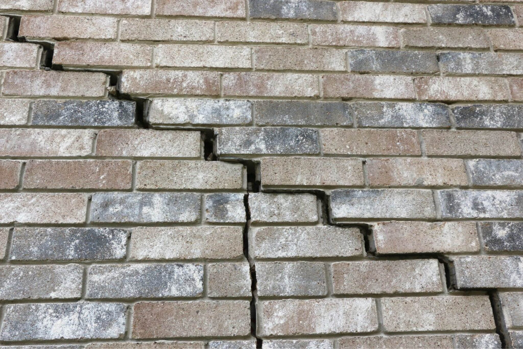 staircase pattern crack in home brick due to foundation failing