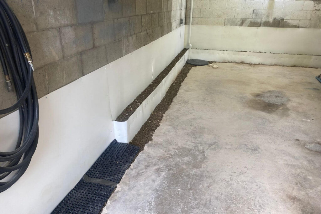 Drain tile system installed in a residential basement