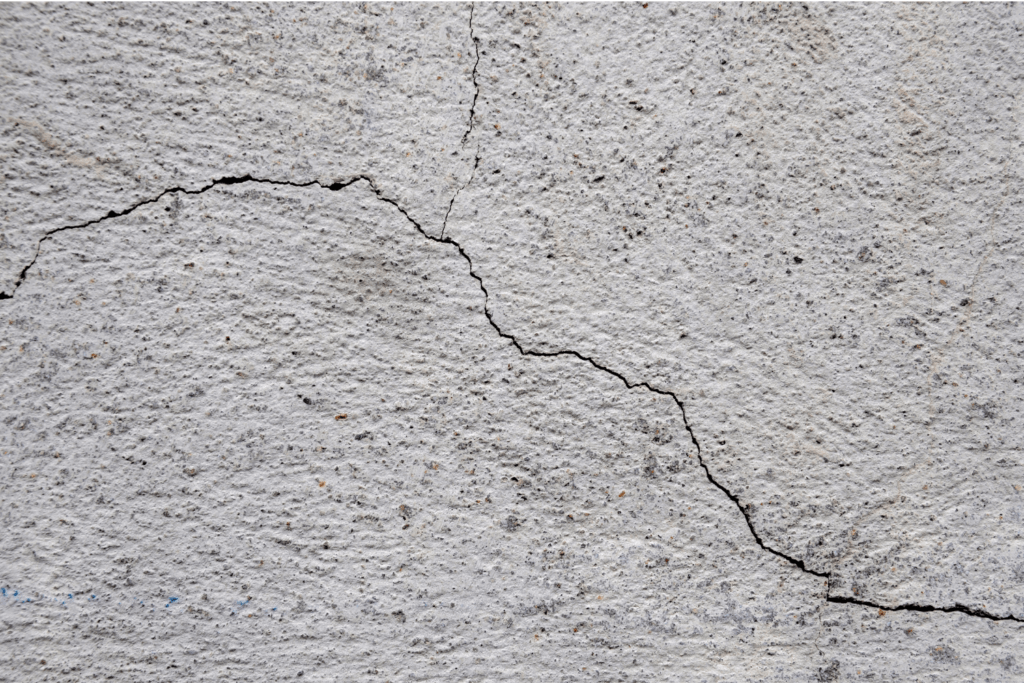 residential wall showing a hairline crack which could be representative of foundation issues
